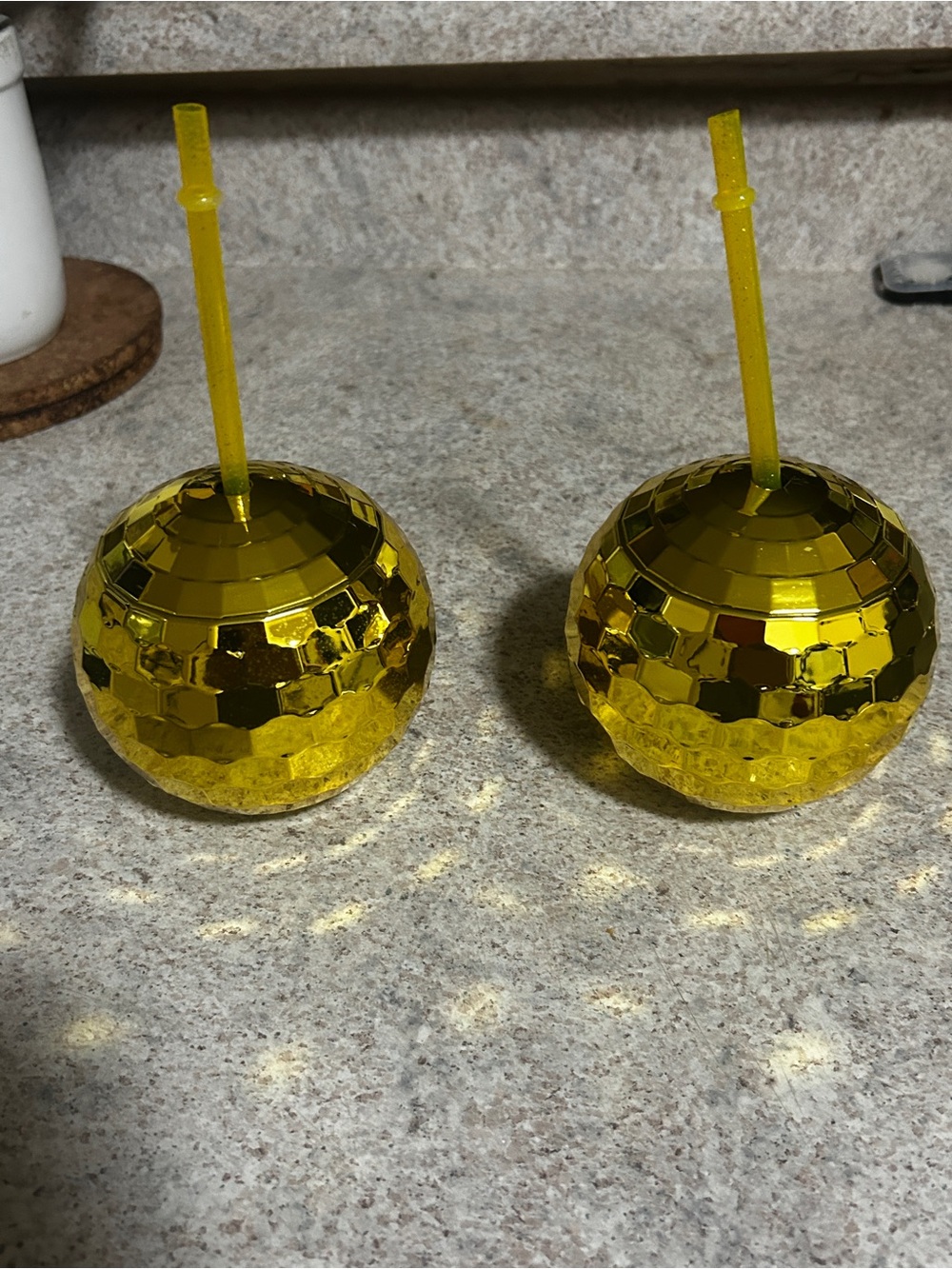 A set of 2 gold disco cups